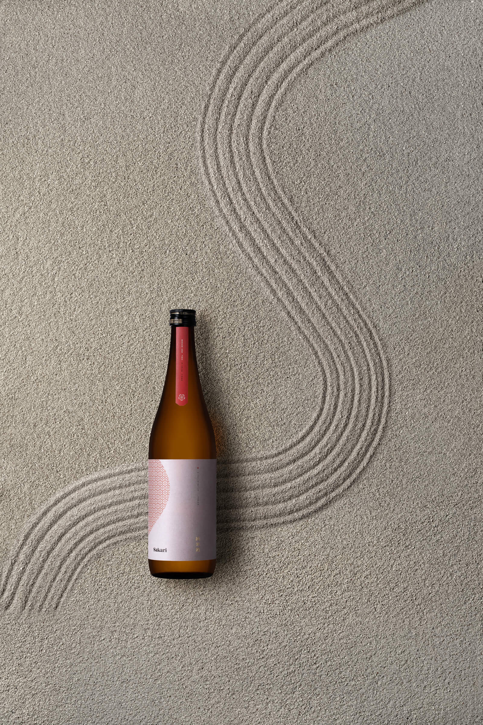 Sakari Sake zen garden red bottle Sublimio branding